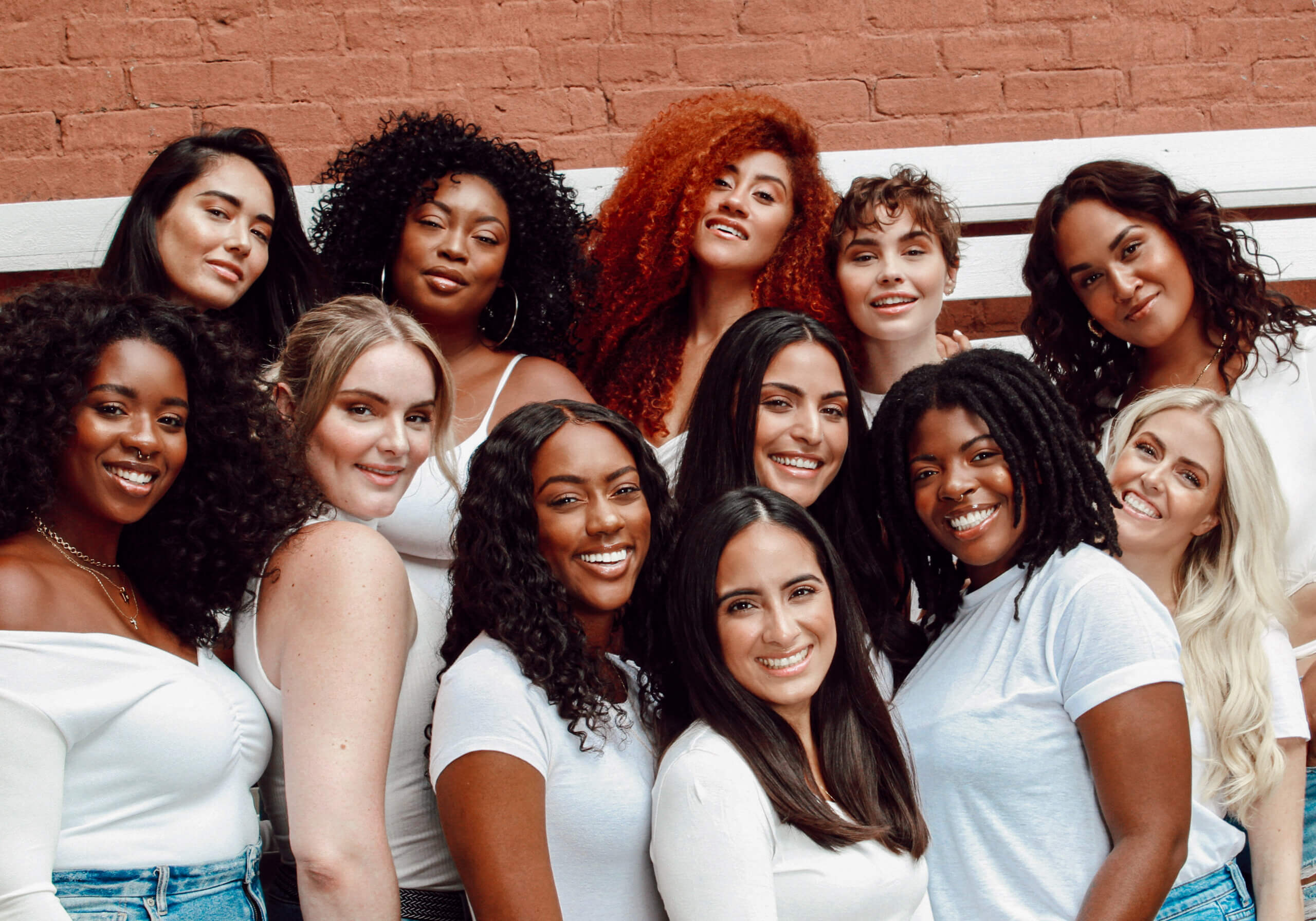 Group of diverse women posing for photo